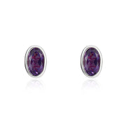 9ct White Gold Amethyst 5x3mm Oval Rub Over Set Stud Earrings. 33-51-098.