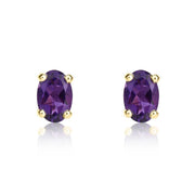 9ct Yellow Gold Amethyst 6x4mm Oval Claw Set Stud Earrings. 33-51-009.